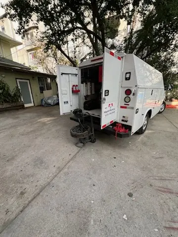 Magnet Plumbing service vehicle on-site for Grease Trap Cleaning in San Carlos Park